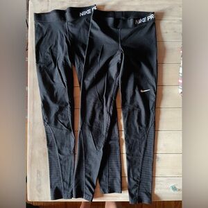 Nike Pro Cold Weather Athletic Leggings. Set of 2. Both size SMALL.